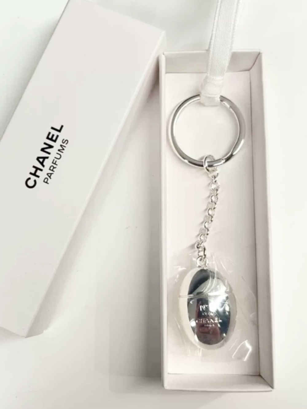 Chanel beauty gift keychain